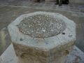 A wellhead that has a concrete lid