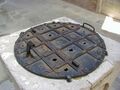 A wellhead that has a metal lid